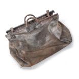 A large Gladstone bag by Hill & Millard Ltd (Military and Colonial outfitters), lined with fitted