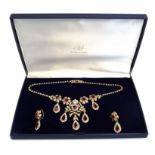 A boxed Attwood collection set of earrings and necklace set with white and red stones