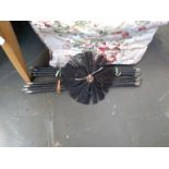 A quantity of drain rods and a chimney brush