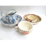 A Burslem wash bowl and jug with bell flower swag decoration together with one other wash bowl and