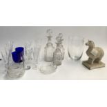 A mixed quantity of glassware to include three decanters and stoppers, a Kevin McCloud glass vase, a