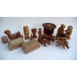 A mixed lot of mainly wooden items to include carved wood African animals, Mexican pottery, inlaid