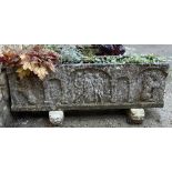 A large composite stone trough planter, raised on stone supports, 118x26x35cmH