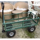 A garden trolley with drop sides, on rubber tyres, 89x49cm