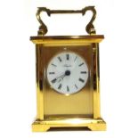 An Angelus brass carriage clock with bevelled glass front, quartz movement, 14cmH