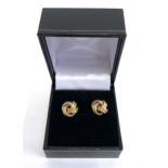 A pair of 9ct gold knot earrings, approx. 2.3g