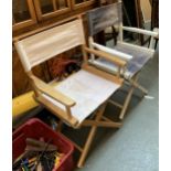 Two folding beechwood and canvas garden chairs