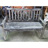 A slatted garden bench, 122cm wide