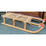 A Gloco West German beechwood sled, 119cmL