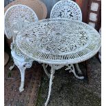 A painted aluminium garden table, 80cmD; together with two matching chairs