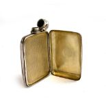 A silver plated engine turned hip flask/cigarette case, 14cmH