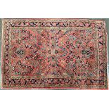 A small Persian rug, 104x160cm