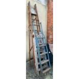 A vintage wooden folding step ladder, together with two others