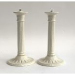 A pair of Spode T Goode candlesticks in the form of reeded ionic columns (each af)