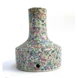 A ceramic lamp base of compressed form, profusely enamelled with interlocking florals (af), 31cmH