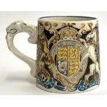 A George VI commemorative mug painted by Laura Knight for Burleigh