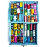 A Matchbox collectors case with approx. 57 die-cast models with bus, car and racing interest all
