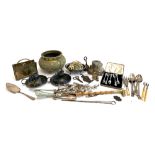 A mixed lot of plated brass and other metal items to include horse brasses, candle holders, brass