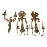 A pair of giltwood two arm wall sconces with tied ribbon pediment, each 54cm high; together with one