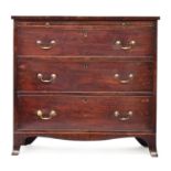 A Regency mahogany bachelor's chest, the plain top over brushing slide and three cockbeaded