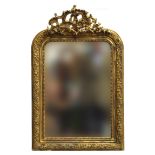 A gilt framed wall mirror with pierced cresting, the plate within bobble moulding and scrolling