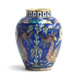 A possibly Samson Iznik style vase depicting dragons and serpents amongst lotus flowers on a