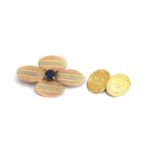A 9ct three colour gold brooch made of four engine turned oval cufflink terminals, set with central