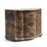 A small 18th century bowfront cabinet, three drawers, all over decoupage decoration, 38.5cm wide,