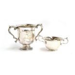 A twin handled silver trophy cup by Horace Woodward & Co Ltd, London 1912, with acanthus capped