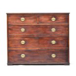 An early 19th century mahogany chest of drawers, double D moulded top over two short and three