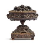 A 19th century Black Forest jewellery casket, with profuse floral decoration, the casket with