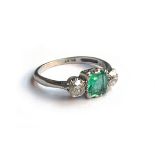 A platinum set emerald and diamond ring, the emerald approx. 5mm x 6mm, size N 1/2, approx. 3.7g