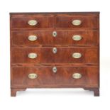 A Regency chest of two short over three graduating drawers, on bracket feet, 95cm wide, 46cm deep,