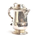 A George III silver tankard originally by John Langlands I, Newcastle 1769, domed hinged cover and S