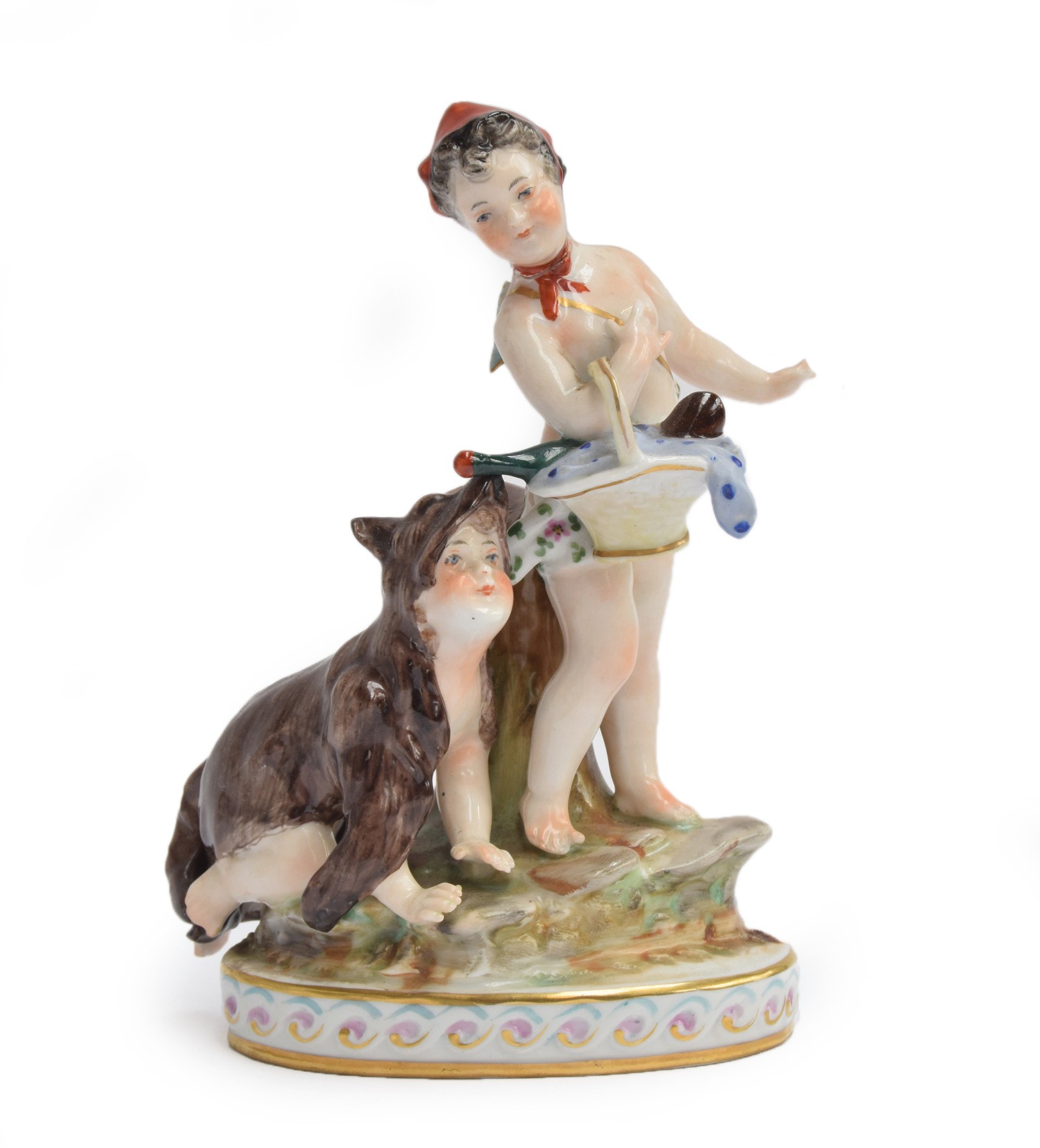 An 18th century Capo di Monte porcelain figure group depicting putti (af), one crawling in a