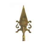 A 19th century West Country Friendly Society brass pole head, modelled as a spear with scrolling