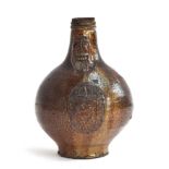A 17th century German salt-glazed stoneware Bellarmine jar, with applied 'Bartmann' mask and