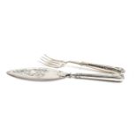 A George III silver fish slice, by William Plummer, London 1784, the floral pierced blade with