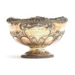 An Edwardian silver pedestal rose bowl by Atkin Brothers, Sheffield 1905, gadrooned and rocaille