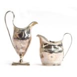 A George III silver helmet form milk jug, London 1804, with beaded rim, bright cut decoration,