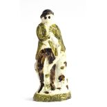 An Astbury-Whieldon figure of a man, c.1745, bears label for the 'L. J Wickes Collection', 13cmH