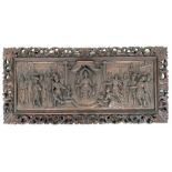 A Flemish carved panel with pierced border, 95cm wide, 44cm deep