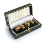 A pair of 9ct gold fox mask cufflinks, by Cropp & Farr, London 1973, each with two fox masks with