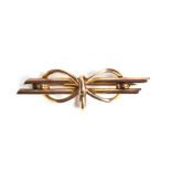 A yellow metal brooch in the form of a bow, 4cm wide, 2.9g