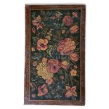 A Persian Qajar lacquer binding panel, polychrome floral design, 23x14cm, in a parquetry frame,