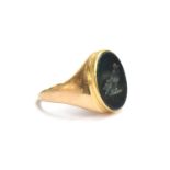 A gold signet ring, the intaglio bloodstone engraved with a single martlet, 8.6g