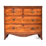 A Regency mahogany bowfront chest of drawers, two short over two long, on shaped apron and swept