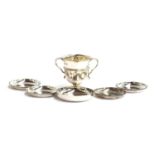 A small twin handled trophy cup by William Hutton & Sons Ltd, 8cm high; together with four silver