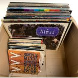 A mixed box of vinyl LPs to include Johnny Guitar Watson, Elvis Presley, Aswad, Saxon, Marillion,