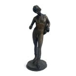 A cast metal figure of a nude male archer, 63cmH